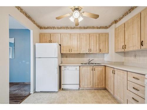 1411-500 Green Road, Stoney Creek, ON - Indoor Photo Showing Kitchen With Double Sink