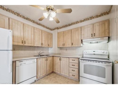 1411-500 Green Road, Stoney Creek, ON - Indoor Photo Showing Kitchen With Double Sink