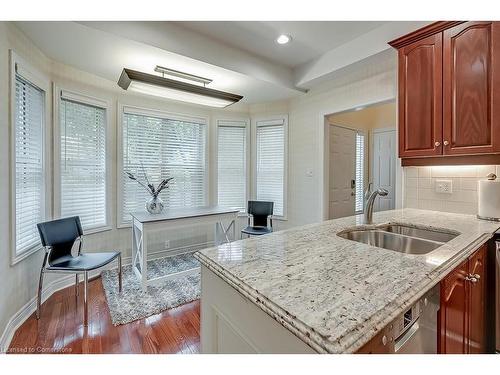 13-1061 North Shore Boulevard E, Burlington, ON - Indoor Photo Showing Kitchen With Double Sink