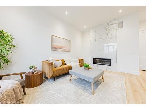 174 Pike Creek Drive, Cayuga, ON - Indoor Photo Showing Living Room With Fireplace