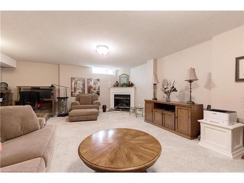 41-2243 Turnberry Road, Burlington, ON - Indoor Photo Showing Living Room With Fireplace