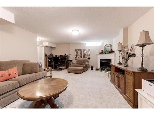 41-2243 Turnberry Road, Burlington, ON - Indoor Photo Showing Living Room With Fireplace