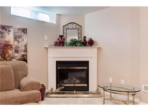 41-2243 Turnberry Road, Burlington, ON - Indoor Photo Showing Living Room With Fireplace