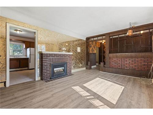 2027 Churchill Avenue, Burlington, ON - Indoor With Fireplace