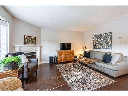 18-2880 Headon Forest Drive, Burlington, ON - Indoor Photo Showing Living Room With Fireplace