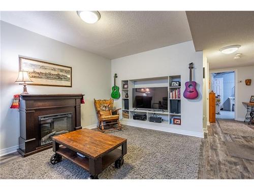 18-2880 Headon Forest Drive, Burlington, ON - Indoor Photo Showing Living Room With Fireplace