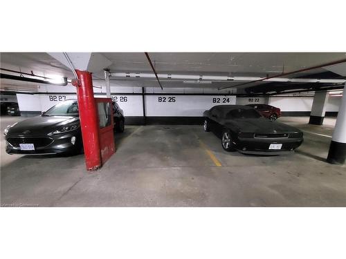 119-1300 Marlborough Court, Oakville, ON - Indoor Photo Showing Garage