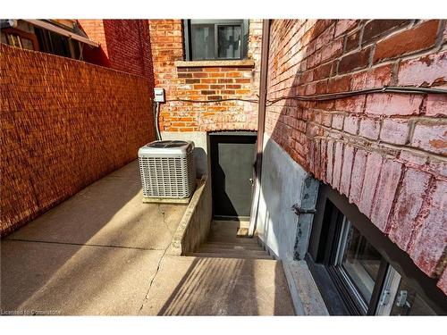 170 Ray Street N, Hamilton, ON - Indoor Photo Showing Other Room With Fireplace