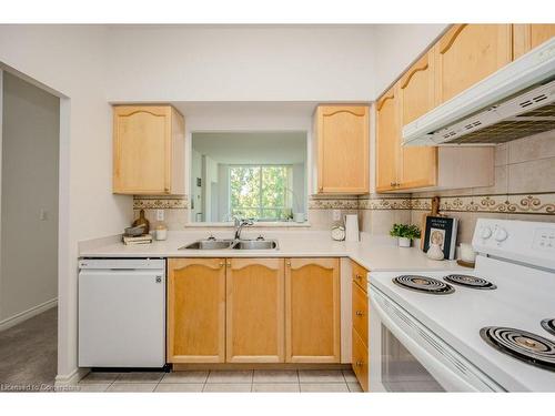 2505-100 Burloak Drive, Burlington, ON - Indoor Photo Showing Kitchen With Double Sink