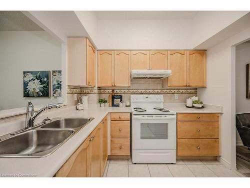 2505-100 Burloak Drive, Burlington, ON - Indoor Photo Showing Kitchen With Double Sink