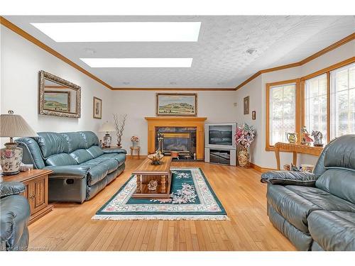 10 Embassy Drive, Hamilton, ON - Indoor Photo Showing Living Room With Fireplace