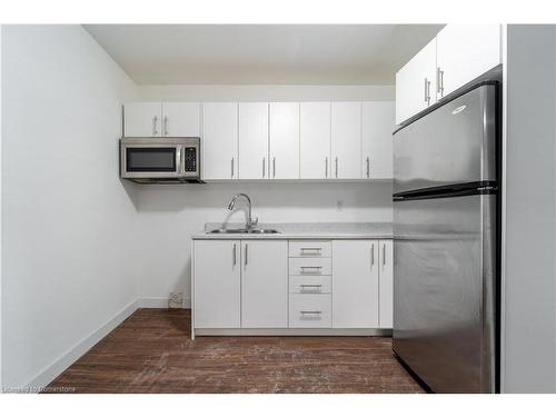 305 Cannon Street E, Hamilton, ON - Indoor Photo Showing Kitchen With Double Sink