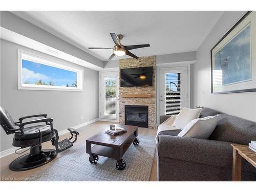 201-10 Brandy Lane, Collingwood, ON - Indoor Photo Showing Living Room With Fireplace