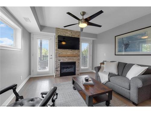 201-10 Brandy Lane, Collingwood, ON - Indoor Photo Showing Living Room With Fireplace