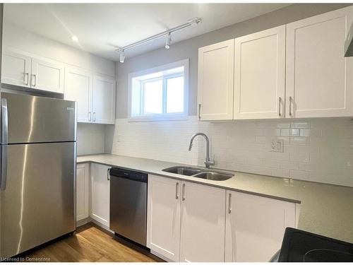 A7-540 King Street E, Hamilton, ON - Indoor Photo Showing Kitchen With Stainless Steel Kitchen With Double Sink