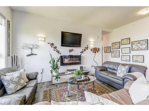 627-125 Shoreview Place, Stoney Creek, ON - Indoor Photo Showing Living Room With Fireplace