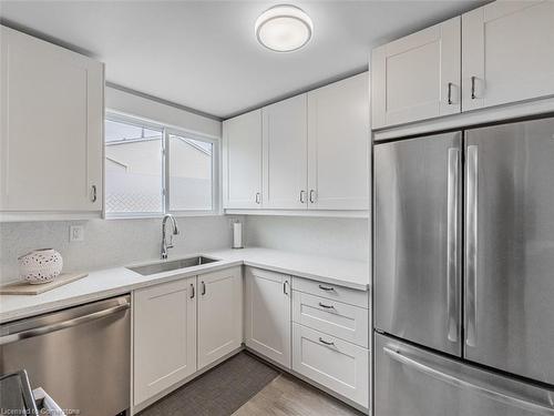 23-120 Quigley Road, Hamilton, ON - Indoor Photo Showing Kitchen With Stainless Steel Kitchen