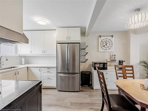 23-120 Quigley Road, Hamilton, ON - Indoor Photo Showing Kitchen With Stainless Steel Kitchen