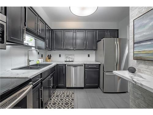 202-159 Lake Street, St. Catharines, ON - Indoor Photo Showing Kitchen With Stainless Steel Kitchen With Double Sink