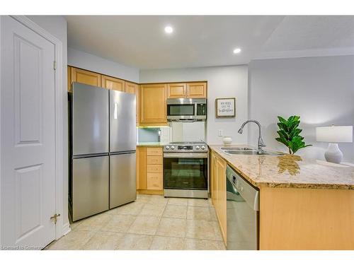 101-40 Old Mill Road, Oakville, ON - Indoor Photo Showing Kitchen With Double Sink