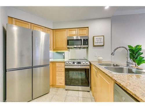 101-40 Old Mill Road, Oakville, ON - Indoor Photo Showing Kitchen With Double Sink