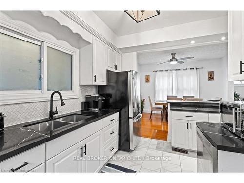 5317 Third Avenue, Niagara Falls, ON - Indoor Photo Showing Kitchen With Double Sink