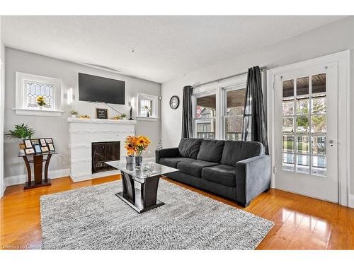 5317 Third Avenue, Niagara Falls, ON - Indoor Photo Showing Living Room With Fireplace