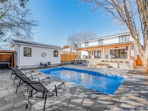 5502 Eaton Avenue, Burlington, ON - Outdoor With In Ground Pool With Deck Patio Veranda