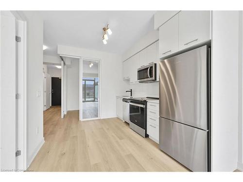 201-385 Winston Road, Grimsby, ON - Indoor Photo Showing Kitchen