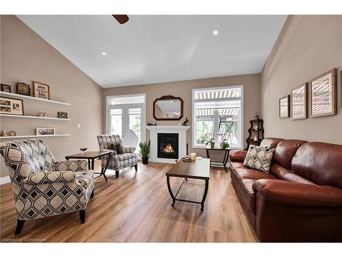 6-247 Munnoch Boulevard, Woodstock, ON - Indoor Photo Showing Living Room With Fireplace