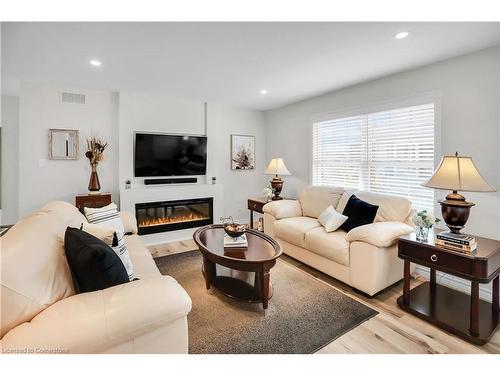 4576 Sara Lane, Beamsville, ON - Indoor Photo Showing Living Room With Fireplace