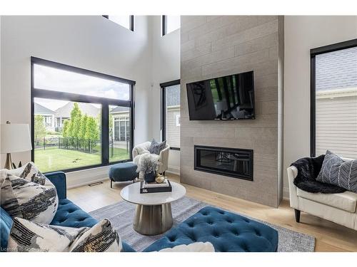 3470 North Shore Drive, Ridgeway, ON - Indoor Photo Showing Living Room With Fireplace