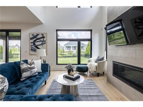 3470 North Shore Drive, Ridgeway, ON - Indoor Photo Showing Living Room With Fireplace