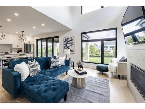 3470 North Shore Drive, Ridgeway, ON - Indoor Photo Showing Living Room With Fireplace