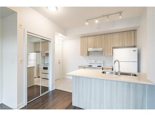 308-90 Charlton Avenue W, Hamilton, ON - Indoor Photo Showing Kitchen With Double Sink