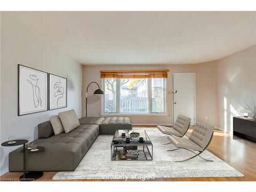 69-120 Quigley Road, Hamilton, ON - Indoor Photo Showing Living Room