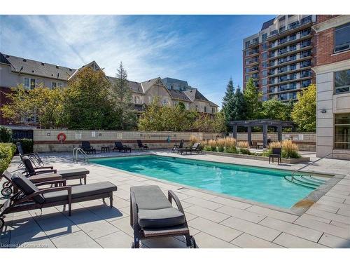 906-2391 Central Park Drive, Oakville, ON - Outdoor With In Ground Pool