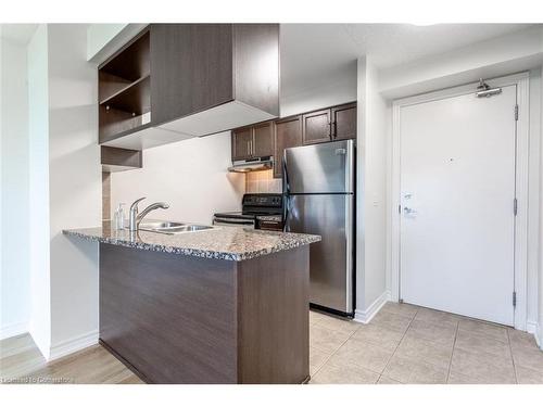 906-2391 Central Park Drive, Oakville, ON - Indoor Photo Showing Kitchen With Double Sink