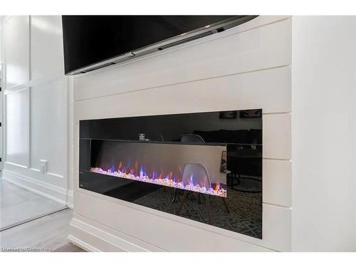 5 Florence Street, Hamilton, ON - Indoor Photo Showing Other Room With Fireplace