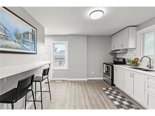 735 Upper Gage Avenue, Hamilton, ON - Indoor Photo Showing Kitchen With Double Sink