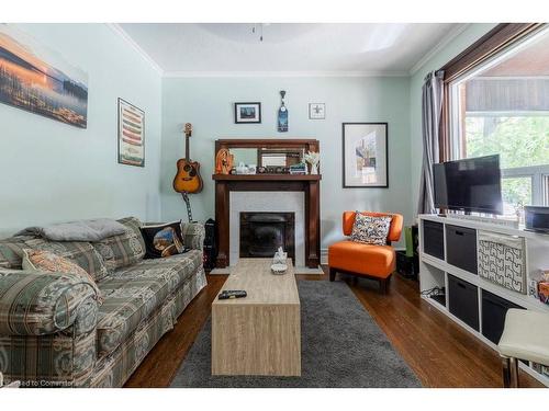 81 Dunsmure Road, Hamilton, ON - Indoor Photo Showing Living Room With Fireplace