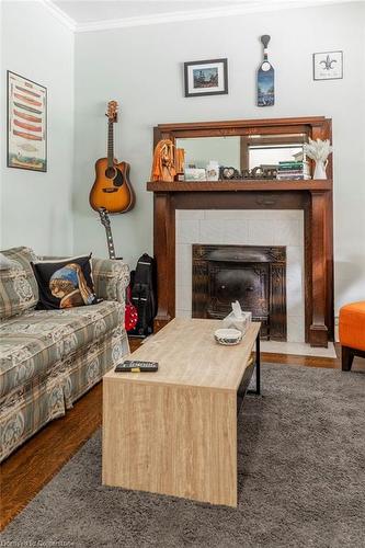 81 Dunsmure Road, Hamilton, ON - Indoor Photo Showing Living Room With Fireplace