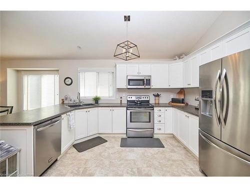 12-17 Riverside Circle, Smithville, ON - Indoor Photo Showing Kitchen With Double Sink