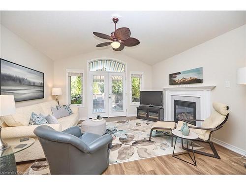 12-17 Riverside Circle, Smithville, ON - Indoor Photo Showing Living Room With Fireplace