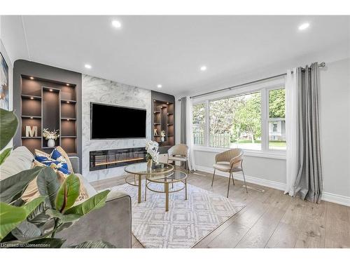 Upper-541 East 16Th Street, Hamilton, ON - Indoor Photo Showing Living Room With Fireplace