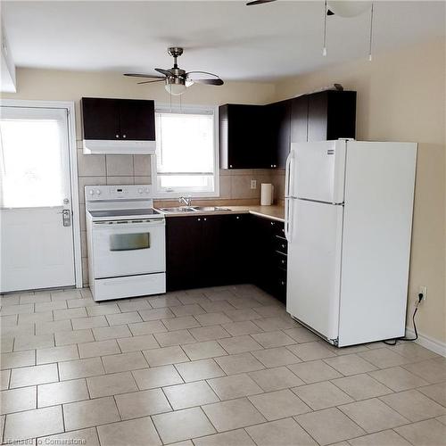 U#2-91 Centennial Parkway S, Stoney Creek, ON - Indoor Photo Showing Kitchen With Double Sink