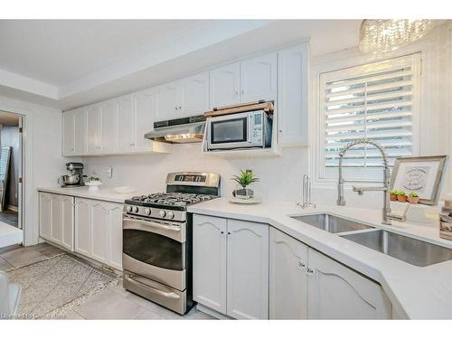 260 Chesley Street, Hamilton, ON - Indoor Photo Showing Kitchen With Double Sink