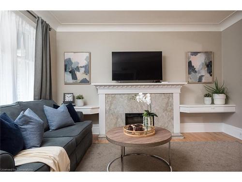 78 Gage Avenue S, Hamilton, ON - Indoor Photo Showing Living Room With Fireplace