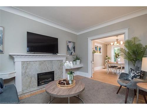 78 Gage Avenue S, Hamilton, ON - Indoor Photo Showing Living Room With Fireplace