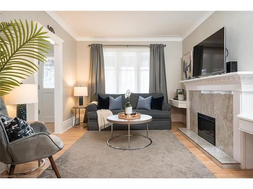 78 Gage Avenue S, Hamilton, ON - Indoor Photo Showing Living Room With Fireplace